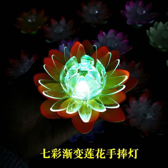 Led colorful lotus lamp before Buddha temple dharma activity blessing and wishing stage performance holding lotus lamp pink